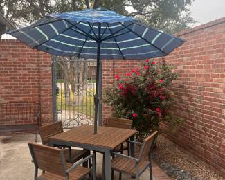 Cute outdoor table and chairs with umbrella