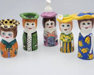 (5) Susan Paley Cermaic Figures
Susan Paley by Ganz Grace ceramic figurines. Including salt and pepper shakers. Two open hat figures and a soap dispenser figurine. Slight chip on green hat and base of soap dispenser as seen in photos.