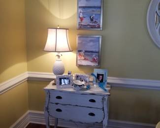 Two drawer dresser; table lamp; art & décor