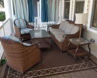 Pretty porch conversation set: couch, coffee table, end tables & two chairs