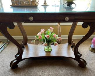 Antique table with glass top