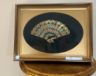 Framed gold fan