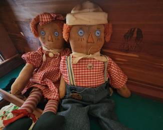 Vintage Raggedy Ann and Raggedy Andy nestled in a Cedar Chest