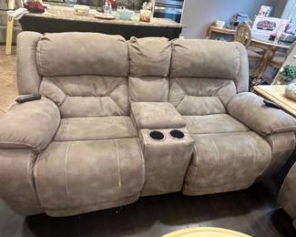 Faux leather entertainment love seat
77” X 39”