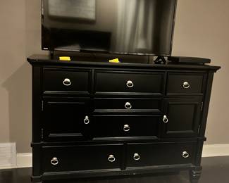 Black wood bedroom dresser. 