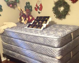 Pair of twin mattresses with bed frames