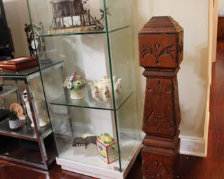 Tea pots , wooden post