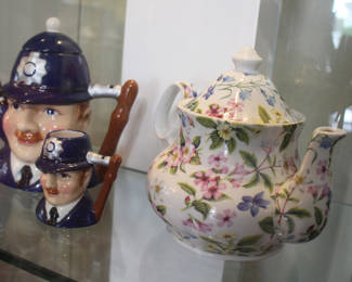 floral tea pot, English police officer mug and tea pot