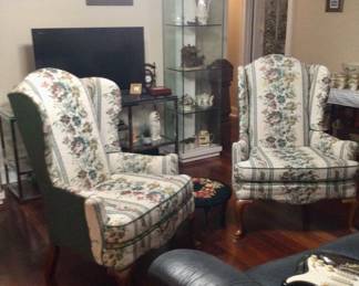 Pair of green floral arm chairs