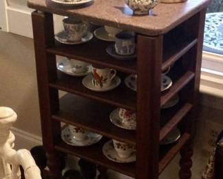 cup and saucer table with marble top