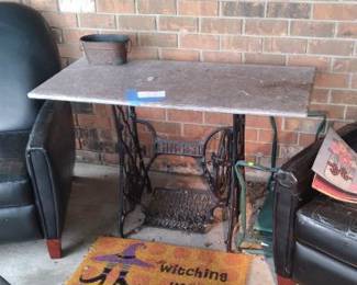 Marble topped sewing machine stand