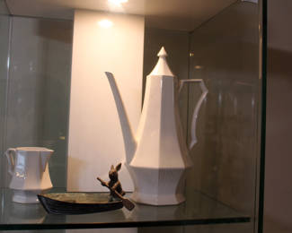 Modern tea pot, rabbit in boat sculpture