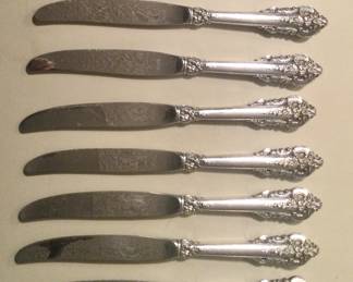 Eight Grand Baroque sterling handled knives, just under 10”