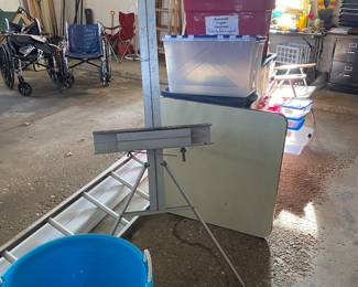 Easel, storage totes, ladder, gutters