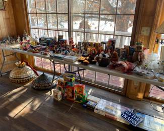 Tin toys, hummels, stained glass lamp shades, toy boxes, train, monopoly 