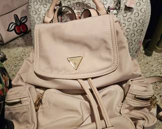 Many many Guess Purses and Backpacks
