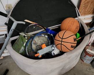 Ottoman with storage, basket balls, tennis racks, toys, etc.