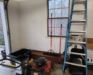 Tall ladder, push mower, trash can, misc