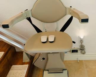 Closeup of chair and remotes