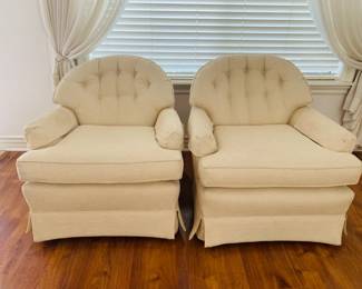 Two Cream Rocker chairs