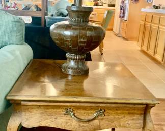 Close-up of 2 of 2 end tables with table lamp