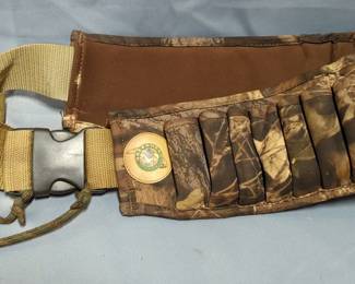 Fringed Leather Rifle Sleeve, Greenhead Gear Camo Cartridge Belt, And Dual Compartment Pouch With Shoulder Strap