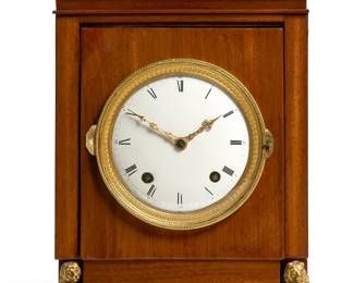 A Directoire gilt bronze mounted mahogany mantel clock
circa 1800

