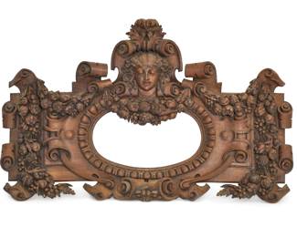 A Continental Baroque style stained walnut overmantel mirror frame
late 19th century