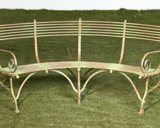 A French wrought iron curved garden bench
Arras
early 20th century