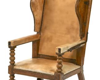 An English iron mounted oak reclining armchair
late 17th century