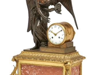A French gilt and patinated bronze and rose marble figural clock
retailed by Payne & Co., London
late 19th century