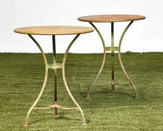 A pair of French wrought iron garden bistro tables
Arras
early 20th century