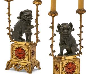 A pair of French gilt and patinated bronze and faux cinnabar lacquer Chinoiserie two light candelabra
early 20th century