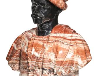 A Continental variegated red and black marble bust of a moor
20th century
