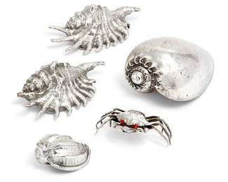 Four Buccellati silver clad shells and a model of a crab
modern