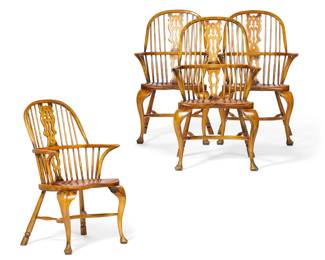 A set of four oak and elm Windsor armchairs
post 1950