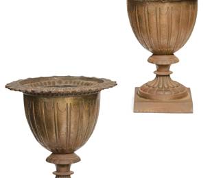 A pair of Neoclassical style cast iron garden urns
20th century