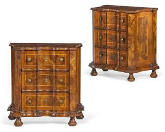 A pair of Italian Baroque style walnut and burr walnut comodini
20th century