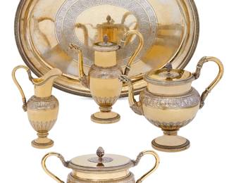 A French Empire style silver gilt four piece tea and coffee service with tray
Maison Odiot, Paris
first half 20th century