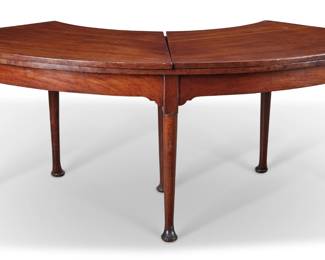 A George II style mahogany hunt table
composed of antique and later elements