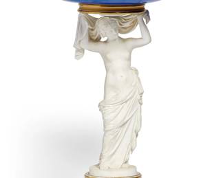 A Royal Copenhagen porcelain figural compote
mid 19th century