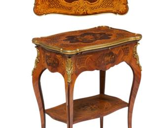 A Louis XV style gilt bronze mounted marquetry salon table
late 19th century