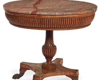 An Italian Neoclassical walnut oval center table
early 19th century