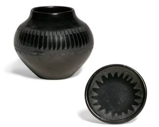 Two San Ildefonso blackware table articles
20th century