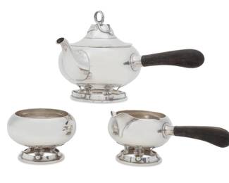 An Allan Adler sterling silver and ebony three piece tea service
second half 20th century