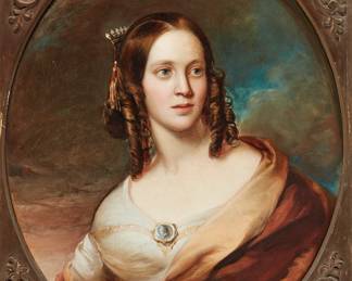 Woman in a white gown with gold wrap