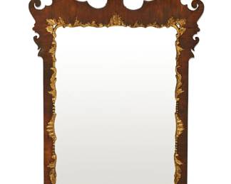 A George II style parcel gilt walnut mirror
19th century