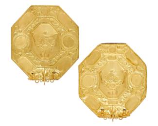 A pair of Dutch Baroque style repousse brass twin branch wall lights
19th century