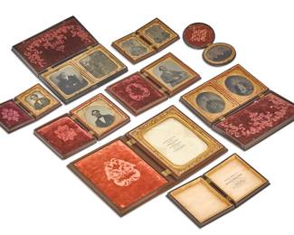 A nine piece collection of tin type photograph cases
19th century