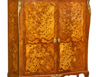 A Louis XV style gilt bronze mounted tulipwood, walnut and marquetry side cabinet
late 19th century